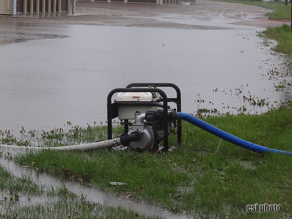 Pumping water off parking lot near 13th St NE - CSi photo